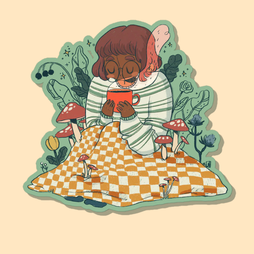 A sticker sits on a yellow background. The sticker design is of a girl sitting under a blanket that is covered in mushrooms and plants while she holds a warm cup of coffee or tea.
