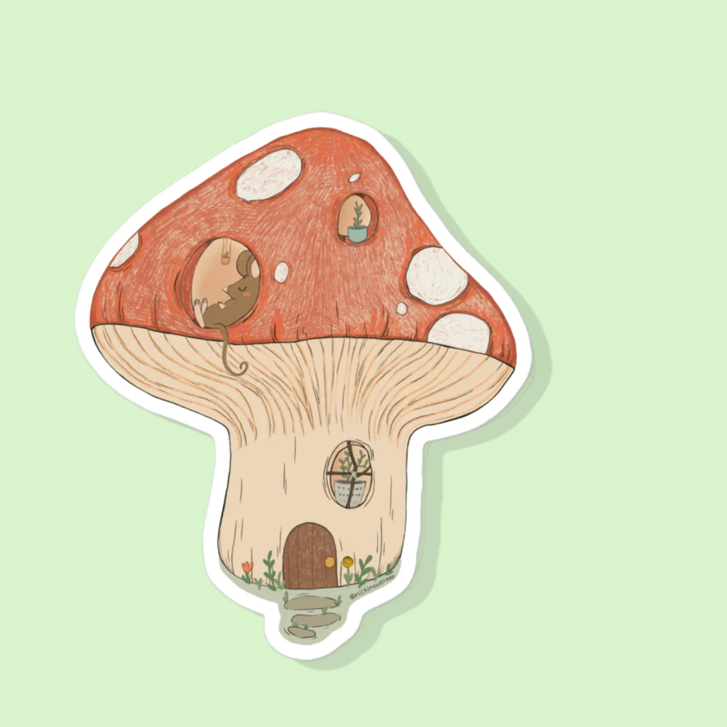 A picture of a sticker that is a small mushroom that has been hollowed out into a house for a small mouse